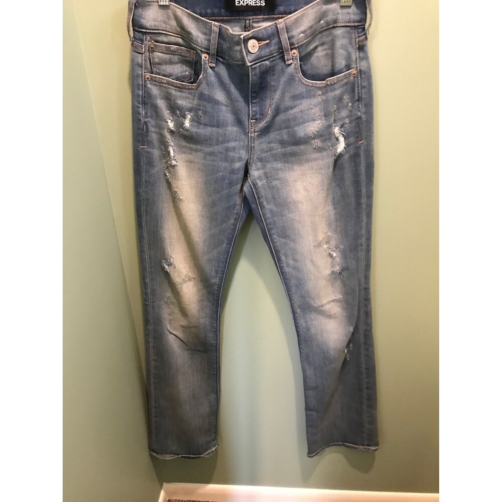 Express Lightly Distressed Mid Rise, Boot Cut jeans. Size 2